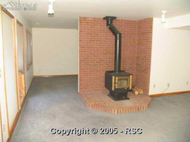 3025 Mt Herman Road Monument, CO 80132 - Photo 6 of 8 family room
