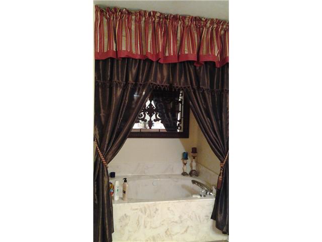 270 Rembert Drive Atoka, TN 38004 - Photo 7 of 11 Jetted tub, master bath also features double walk-in closets and double vanities