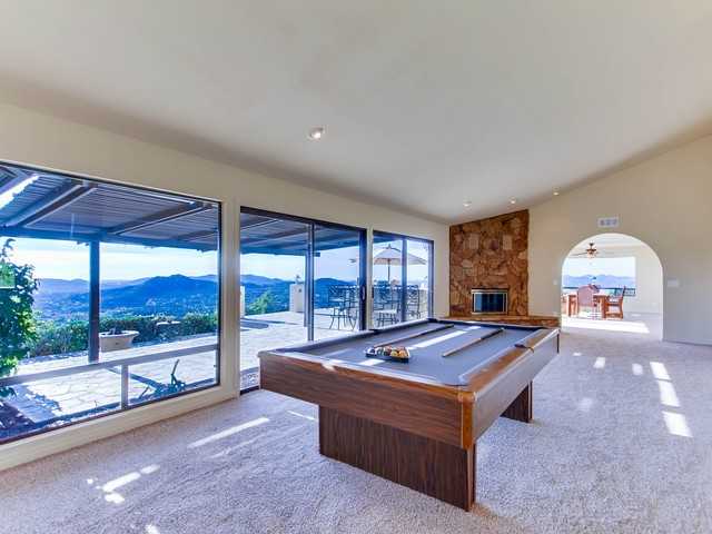 15470 Markar Road Poway, CA 92064 - Photo 10 of 25 Family room with fireplace and westerly views