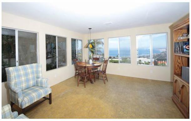 7371 Rue Michael La Jolla, CA 92037 - Photo 15 of 24 Large family room with ocean views and door to deck