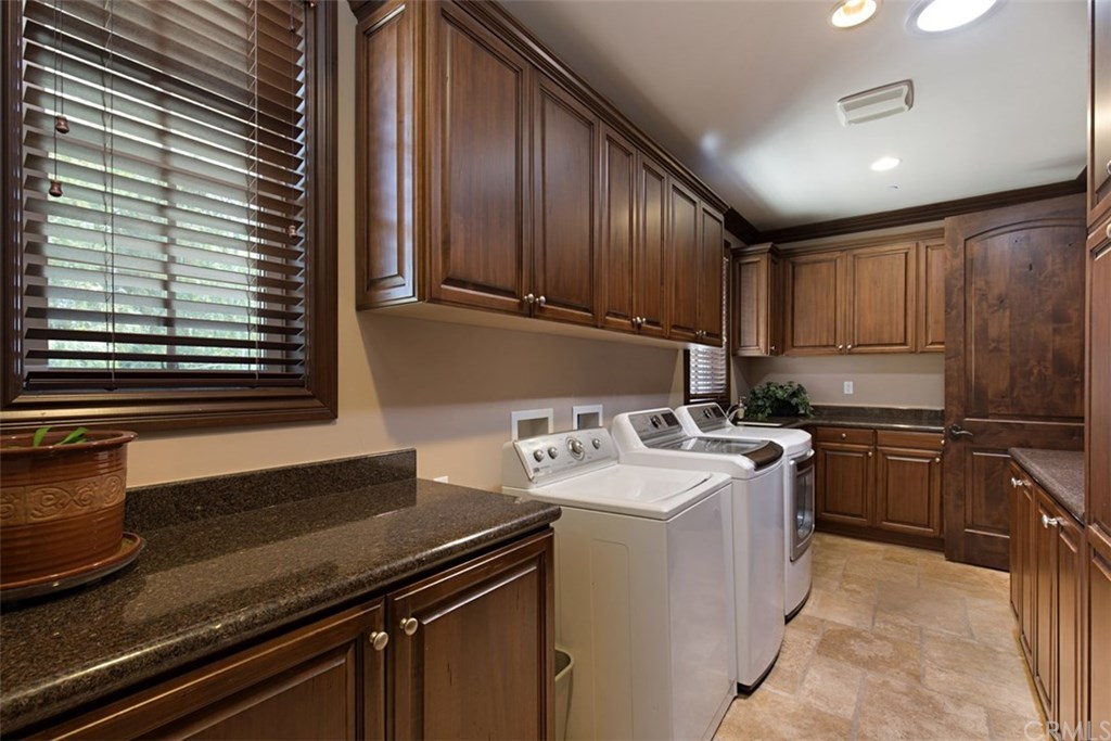 1640 Hillside Avenue Norco, CA 92860 - Photo 25 of 75 Laundry room with PLENTY of storage and close to service door at side of house