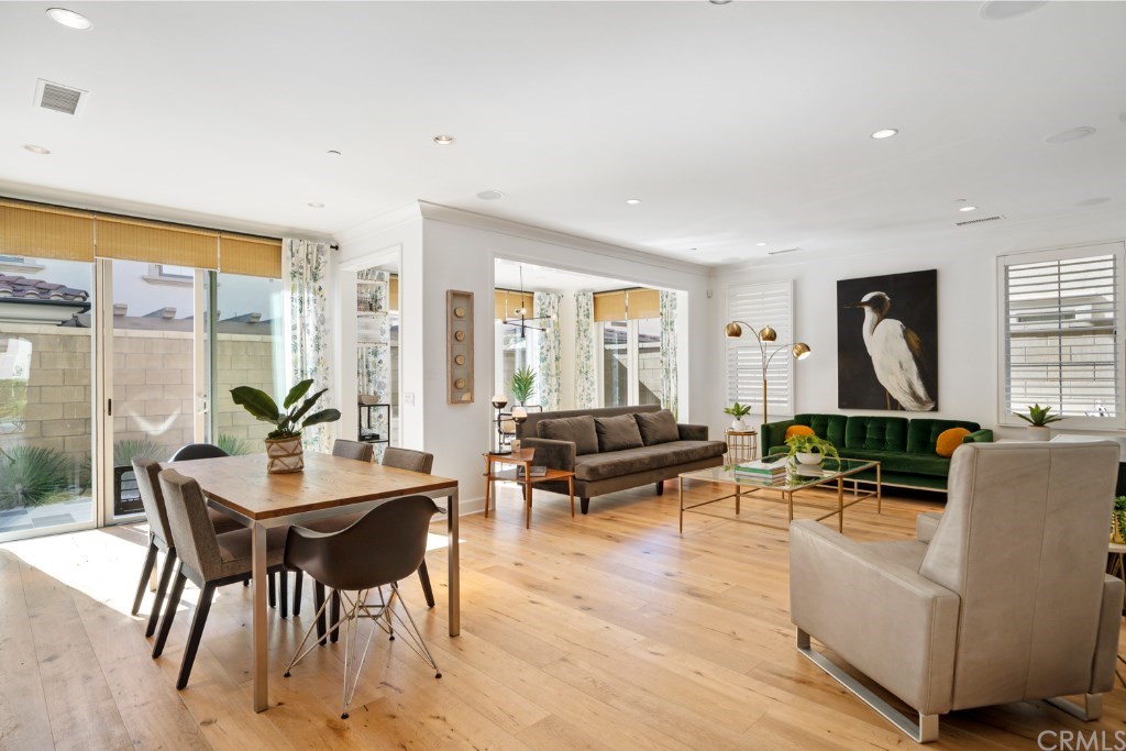 116 Mosswood Irvine, CA 92620 - Photo 9 of 42 View from the entry hall of the dining area, great room and conservatory room.