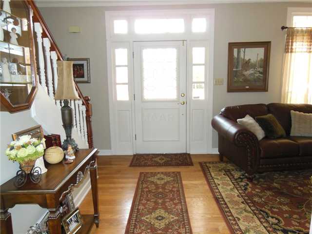 3600 Shea Road Collierville, TN 38017 - Photo 2 of 20 Inviting entry way with beautiful hardwood floors flow into the living room.
