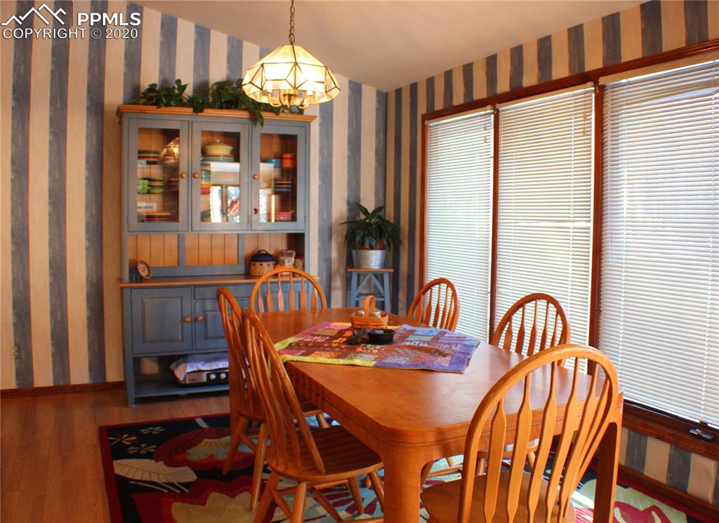 2465 Evergreen Road Colorado Springs, CO 80921 - Photo 11 of 25 True country kitchen with views