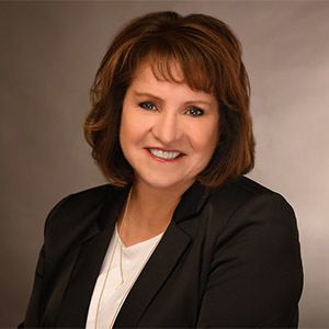 Diane Bucher, Agent in  - Compass