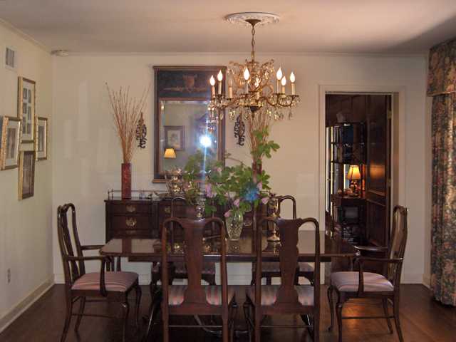 4775 Shady Grove Road Memphis, TN 38117 - Photo 3 of 12 Gorgeous Dining room with hardwoods gorgeous view of brick walled back yard