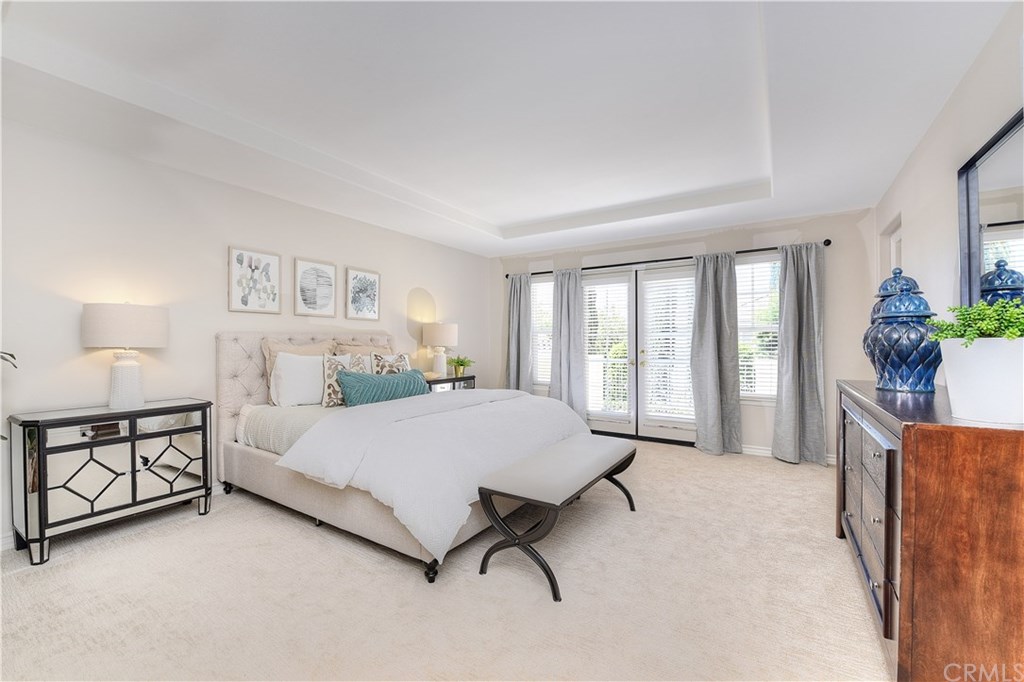 7 Wickford Lane Ladera Ranch, CA 92694 - Photo 19 of 36 Master bedroom with tray ceiling and balcony
