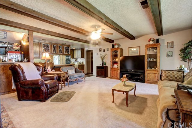 8558 11th Street Downey, CA 90241 - Photo 2 of 26 Living room showing wet bar to the left.