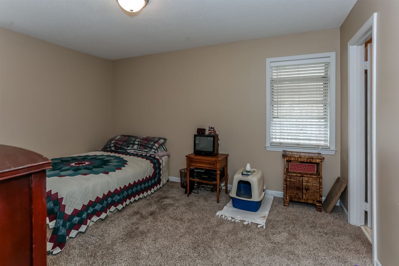 6539 Honeybrook Road Memphis, TN 38134 - Photo 20 of 25 Romantic master bedroom with a private bathroom.