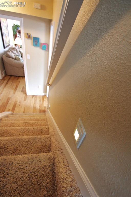 210 Crystal Park Road Manitou Springs, CO 80829 - Photo 15 of 34 Installed Lighting on Stairway to Master Suite