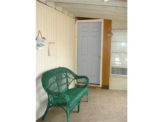 98 Chisholm Lake Spur Road Ripley, TN 38063 - Photo 7 of 9 Cozy screened in porch!