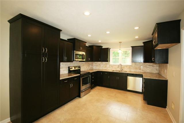 2308 West Trimble Road Milton, TN 37118 - Photo 5 of 30 RECENTLY RENOVATED KITCHEN HAS STAINLESS STEEL APPLIANCES, GRANITE COUNTERS, CUSTOM CABINETRY, TILE BACKSPLASH, TILE FLOORS, & RECESSED LIGHTING! 2308 W TRIMBLE ROAD, MILTON, TN, 37118!