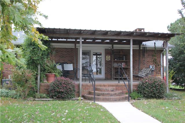 81 Hudson Road Ethridge, TN 38456 - Photo 5 of 30 You will enjoy the peaceful country on your coved porch...