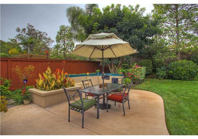 2325 Longfellow Road Carlsbad, CA 92008 - Photo 22 of 25 Enjoy the built in BBQ with cozy benches surrounding the eating area.