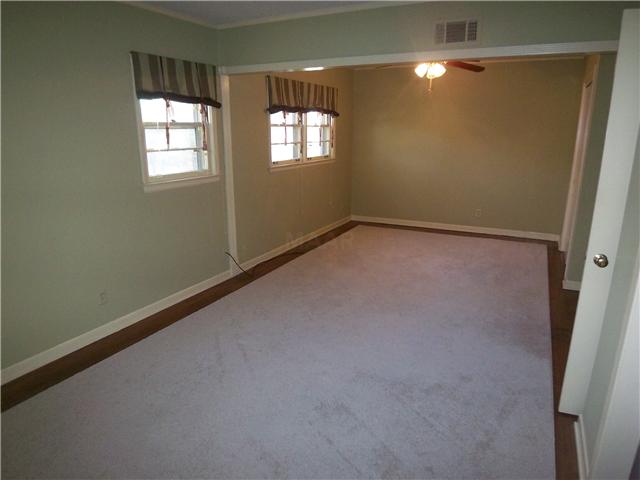 5353 Mason Road Memphis, TN 38120 - Photo 7 of 12 Two bedrooms with wall removed to create a spacious master with two closets. This bedroom uses the larger bath just outside the door. Great use of space---but seller will return the wall, if desired.