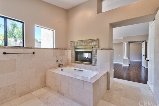 3086 Diamondview Circle Corona, CA 92882 - Photo 18 of 66 The dual fireplace faces the master bathroom and the master bedroom.