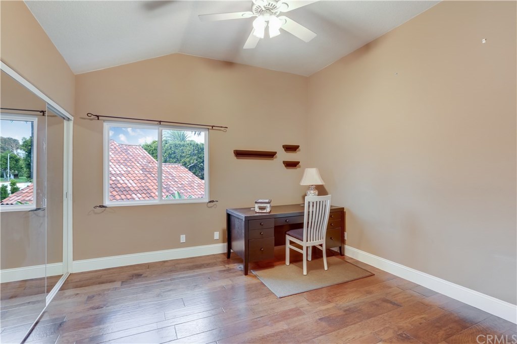 6 Via Colorso San Clemente, CA 92672 - Photo 15 of 32 Upstairs bedroom #1, hardwood flooring, sliding mirrored closet doors.