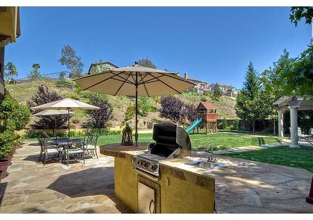 2416 Lapis Road Carlsbad, CA 92009 - Photo 12 of 25 The BBQ island is just steps from the kitchen ...