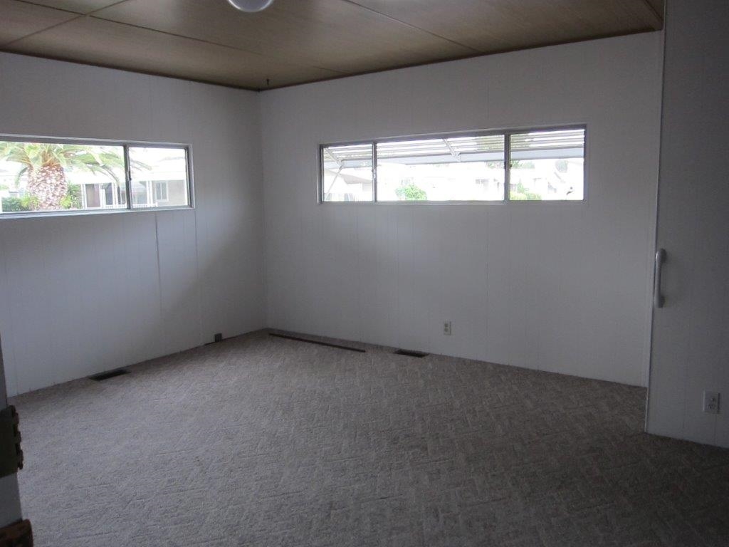 1925 Otay Lakes Road, Unit 87 Chula Vista, CA 91913 - Photo 17 of 25 Master bedroom is huge!! Bright and cheery with two walls of windows.