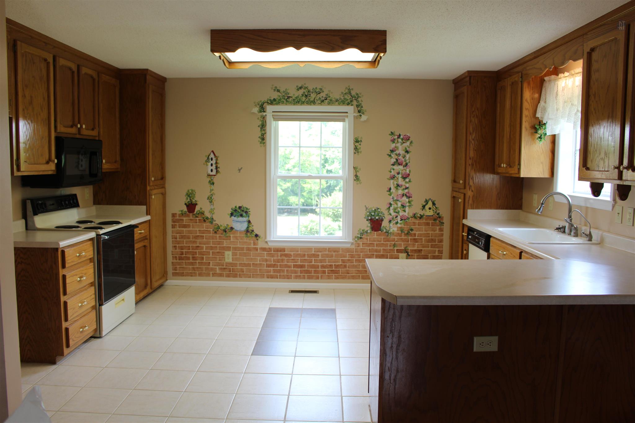 3649 Greens Mill Road Spring Hill, TN 37174 - Photo 10 of 34 Dream large kitchen with custom art work