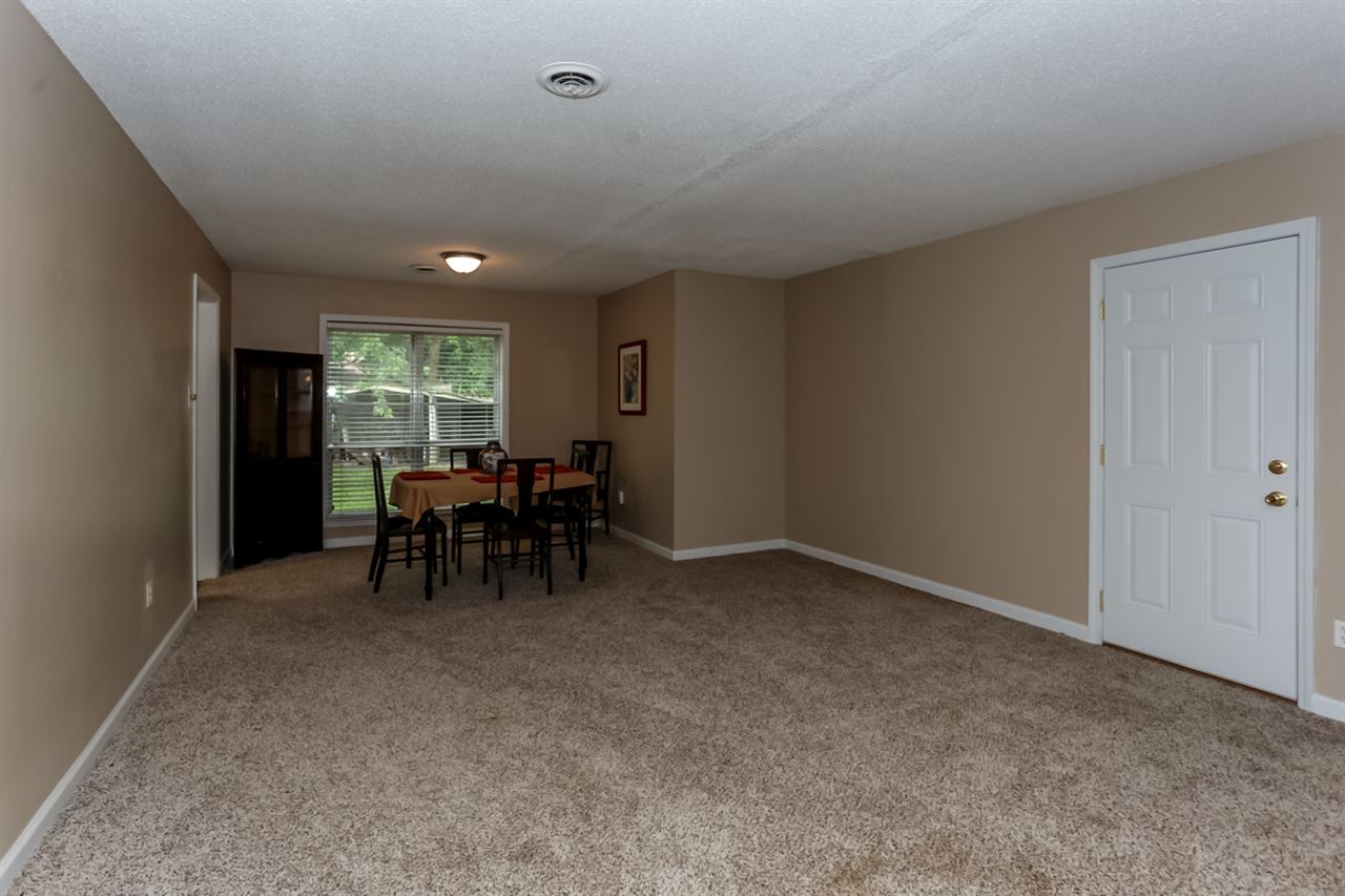 6539 Honeybrook Road Memphis, TN 38134 - Photo 3 of 25 To the right of the entry is the huge living and dining room combination, which is perfect for entertaining guests.