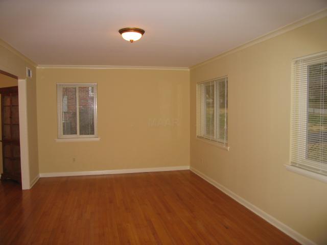 5549 Normandy Road Memphis, TN 38120 - Photo 2 of 10 Completely redone, freshly painted and beautifully refinished hardwood floors.