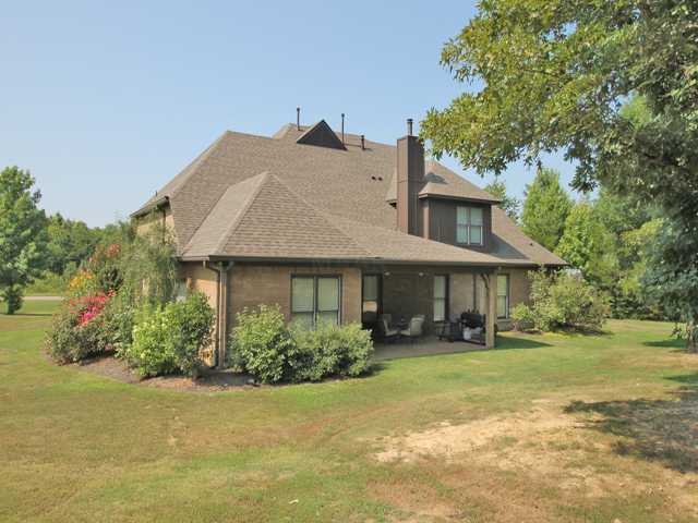 12644 Pinckley Road Arlington, TN 38002 - Photo 22 of 25 View of back of house with covered patio.