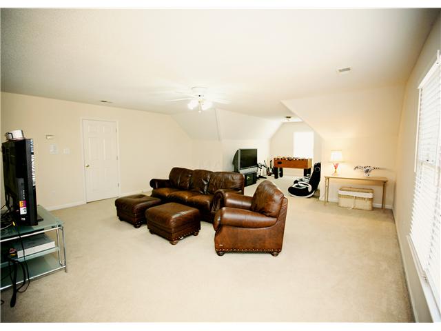 1028 Stanhope Road Collierville, TN 38017 - Photo 11 of 12 Huge playroom. Can hold everything for family night or for the kids to enjoy with friends.