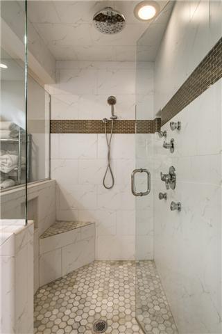 1108 Natchez Road Franklin, TN 37069 - Photo 9 of 25 Walk in tiled shower features invisible glass door, rainhead, and spa jets.