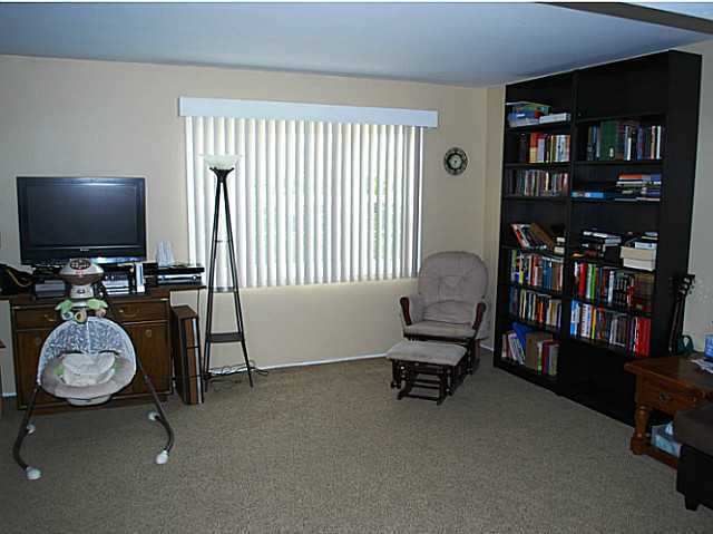 11941 Royal Road, Unit C El Cajon, CA 92021 - Photo 14 of 25 New Windows throughout, including Bay Window in living room.