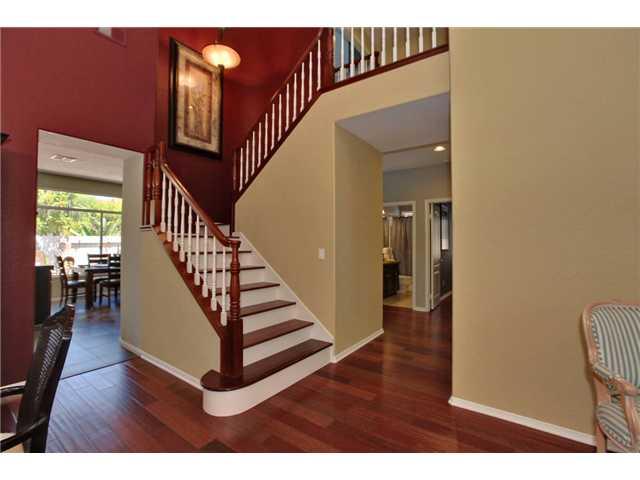 2310 Terraza Ribera Carlsbad, CA 92009 - Photo 4 of 25 Wood trimmed staircase