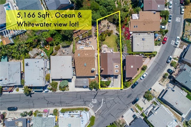 34096 El Contento Dana Point, CA 92629 - Photo 3 of 43 Truly a rare and amazing opportunity to own a quintessential Lantern Village beach bungalow situated atop one of the largest LOTS in the area with OCEAN and Whitewater vistas!