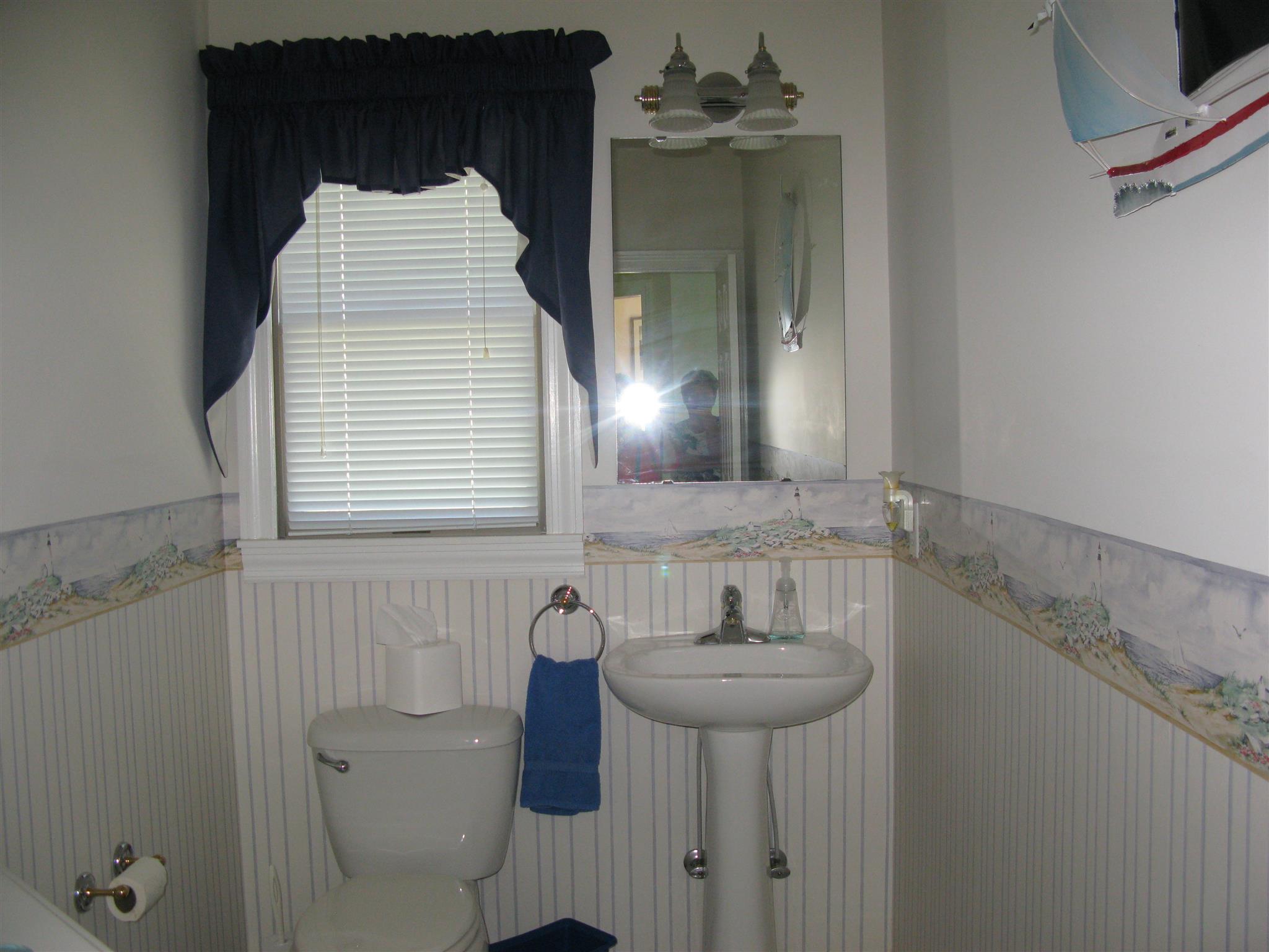 44 Spring Valley Road Taft, TN 38488 - Photo 41 of 45 Powder room for guest, just off kitchen
