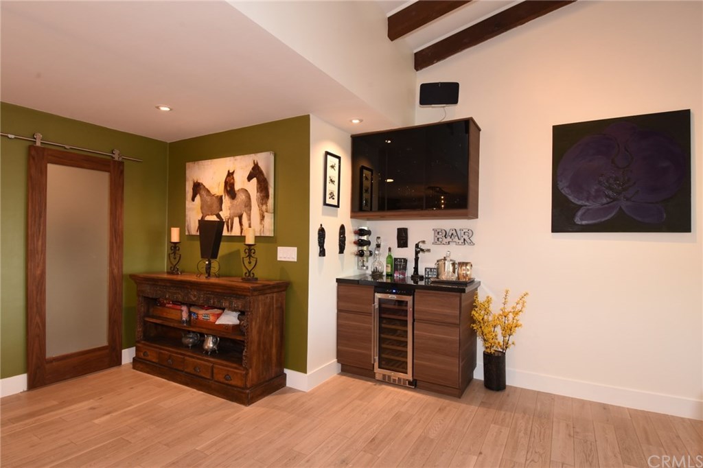 12 Harbor Sight Drive Rolling Hills Estates, CA 90274 - Photo 20 of 56 Close up of the wine bar area. Barn slider door to the left opens to the mud room and garage beyond.