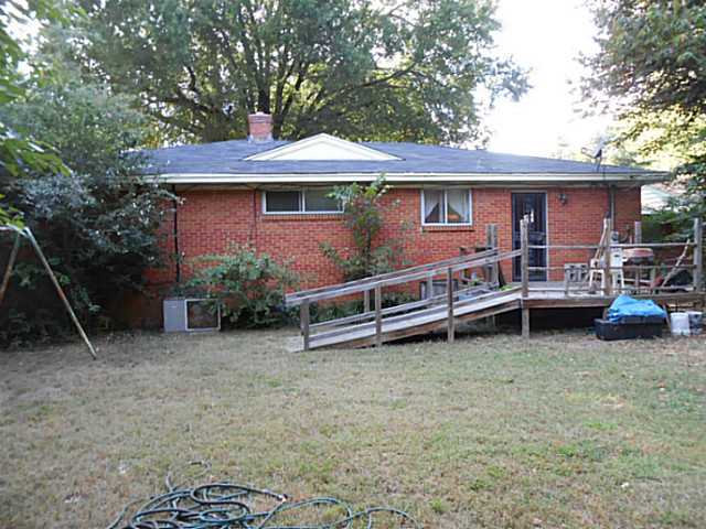 838 North Perkins Road Memphis, TN 38122 - Photo 14 of 17 View of the back of the home..Wood deck..Ramp..Fenced..Large yard..