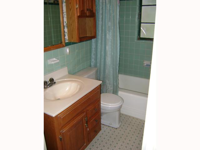 5055 Quince Road Memphis, TN 38117 - Photo 8 of 12 Hall Bath Room has ceramic tile walls and real tile floors