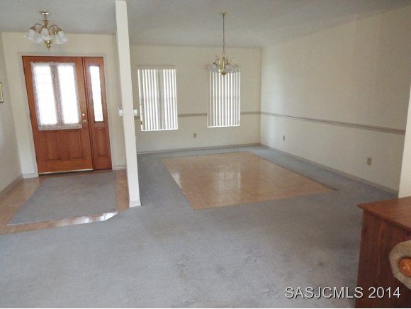 529 Moultrie Wells Road St. Augustine, FL 32086 - Photo 4 of 23 Open Foyer and Dining Area