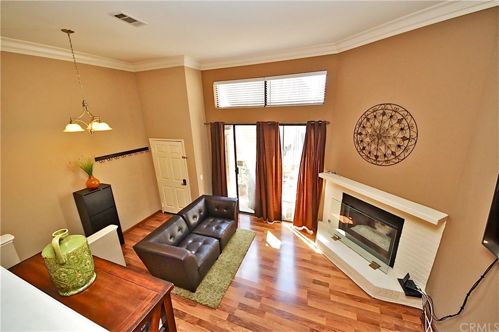 1208 Mayflower Avenue, Unit C Monrovia, CA 91016 - Photo 10 of 47 Light and airy living room with a raised hearth fireplace!