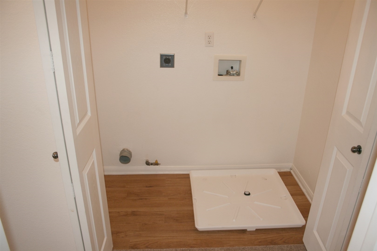 1464 Rancho Rose Way, Unit 25 Oceanside, CA 92057 - Photo 12 of 16 upstairs laundry closet