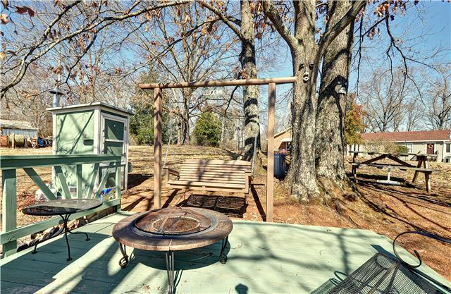 1652 Bend Road Clarksville, TN 37040 - Photo 3 of 19 Beautiful Sitting Area Underneath the Trees with Smoker