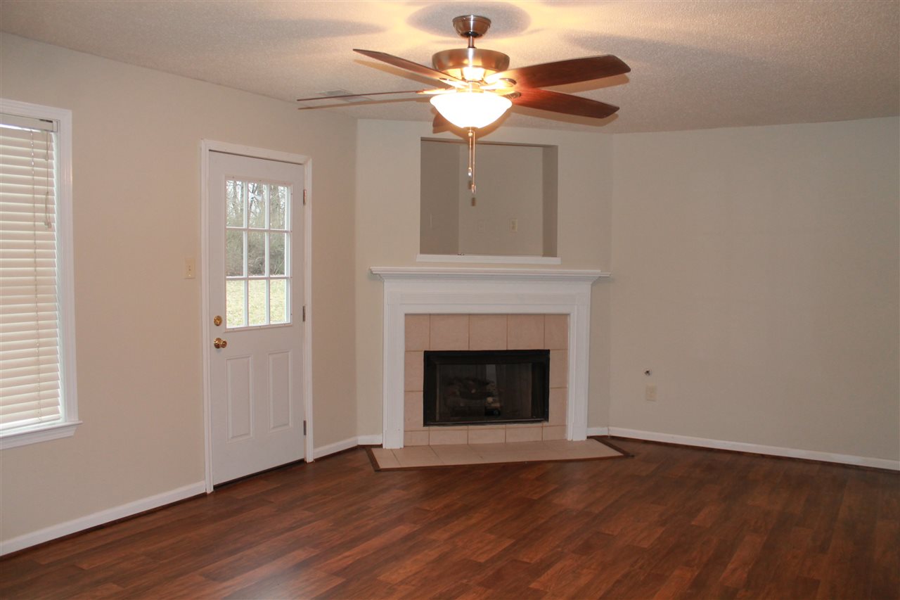 362 Brown Road Drummonds, TN 38023 - Photo 2 of 15 New laminate flooring and fireplace for those cold winter nights