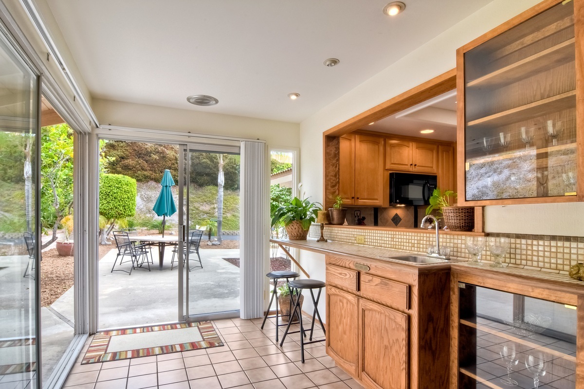 1764 Ivy Road Oceanside, CA 92054 - Photo 11 of 25 Complete with a wet bar! And access to the back patio.