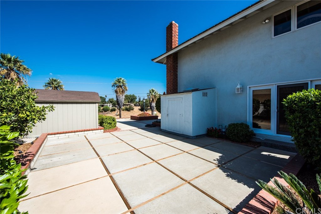 2001 Cypress Point Drive Corona, CA 92882 - Photo 55 of 62 Side yard off of the master bedroom with two storage sheds