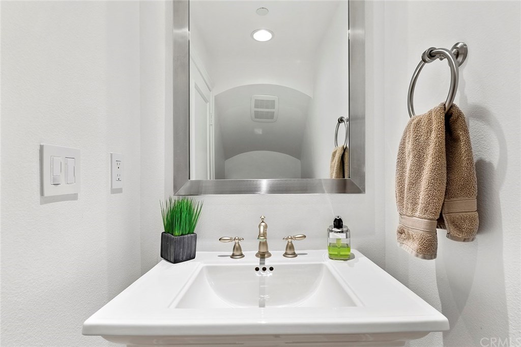 20 Highpoint Irvine, CA 92603 - Photo 24 of 65 Powder room as base of stairway