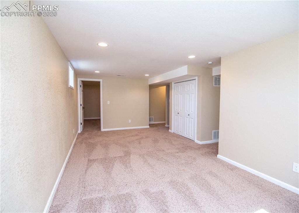 1531 Prairie Road Colorado Springs, CO 80909 - Photo 19 of 30 You will find 2 bedrooms and a full bathroom in the basement as well.