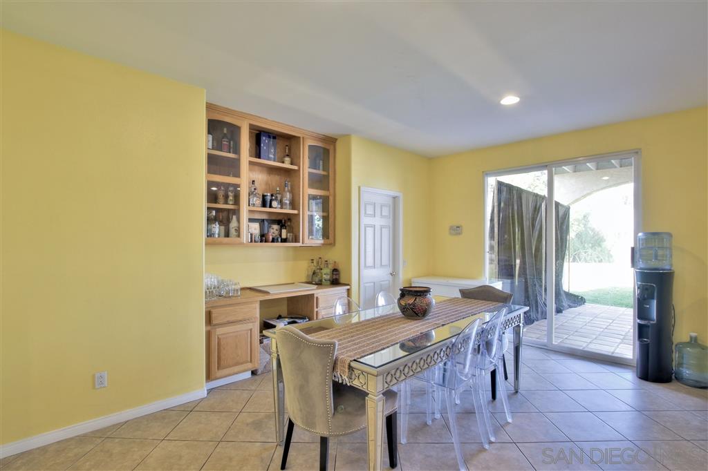17250 Scottsdale Road Riverside, CA 92504 - Photo 10 of 25 Dinning Room with access to Laundry Room and Built in Desk with Hutch