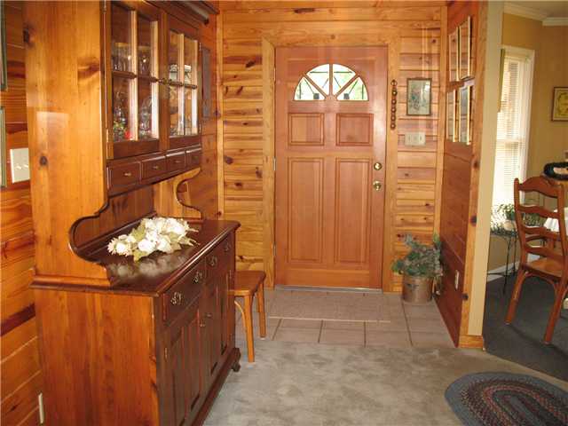 3135 Caledonian Road Memphis, TN 38119 - Photo 3 of 25 A Large Open Foyer....tile flooring....pristine wood walls...