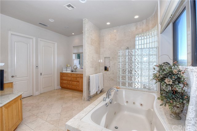 38421 Carrillo Road Fallbrook, CA 92028 - Photo 30 of 57 MASTER BATHROOM HAS HEATED FLOORS, HEATED TOWEL BAR, JETTED TUB, A MARBLE WALK-IN SHOWER AND DOUBLE WALK-IN CLOSETS