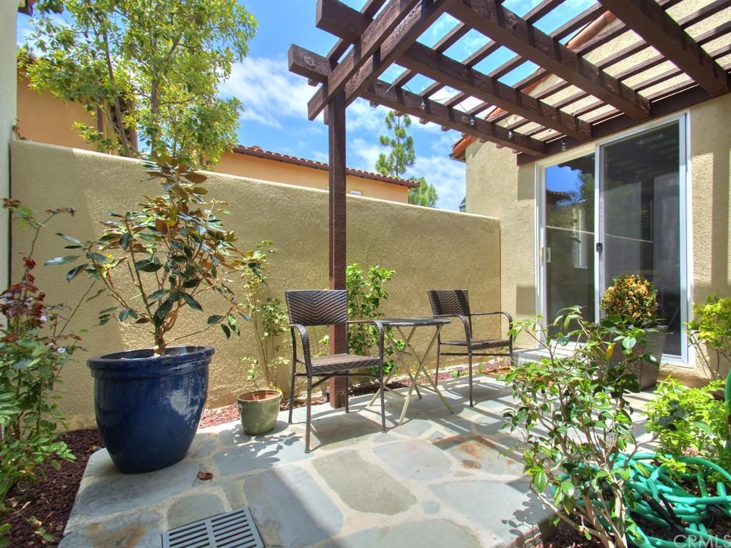 124 White Flower Irvine, CA 92603 - Photo 10 of 26 A very private beautifully landscaped patio. It has a new fountain and has been very beautifully landscaped since this picture was taken. A current picture is coming!