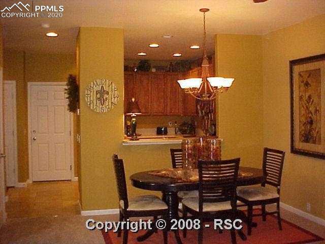4088 Diamond Ridge View Colorado Springs, CO 80918 - Photo 3 of 15 Diningroom with Bar, Great for Entertaining.
